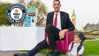 Tallest and shortest men meet for the first time  Guinness World Records Day 2014 [upl. by Marou]