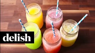 How To Make Skittles Slushies  Delish [upl. by Armahs85]