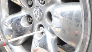 How To Remove Chrome Caps From Lug Nuts [upl. by Sitelc]