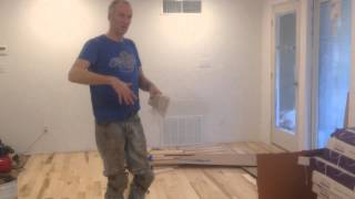 Gluing down prefinished solid hardwood flooring directly over concrete slab [upl. by Orapma]