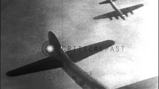 A burning American B17 aircraft falls through clouds in Germany HD Stock Footage [upl. by Toby897]