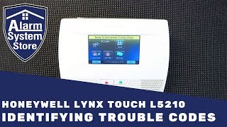 How To Clear Trouble Conditions On Honeywell Lynx L5210  AlarmSystemStore [upl. by Zippel]