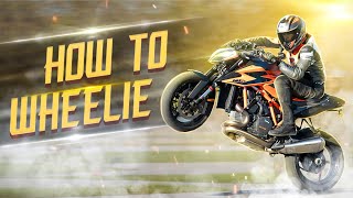 HOW TO WHEELIE A BIG CC BIKE  RokON VLOG 108 [upl. by Hewie375]