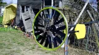 Simple home made wind turbine from bike wheel in the wind [upl. by Merlina31]