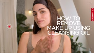 How to remove makeup using a cleansing oil  Clarins [upl. by Willdon]