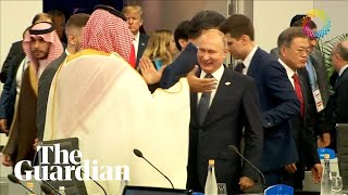 Putin and Saudi crown prince highfive at G20 summit [upl. by Idihc]