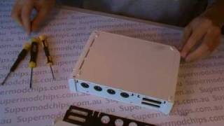 How to Disassemble a Nintendo Wii [upl. by Einnal]