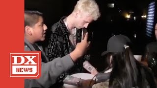 Machine Gun Kelly Signs Autograph Then Immediately DESTROYS It After Fan Brings Up Eminem [upl. by Dido]