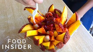 Whole Mangos Are Covered In Chamoy Paste [upl. by Vinia]